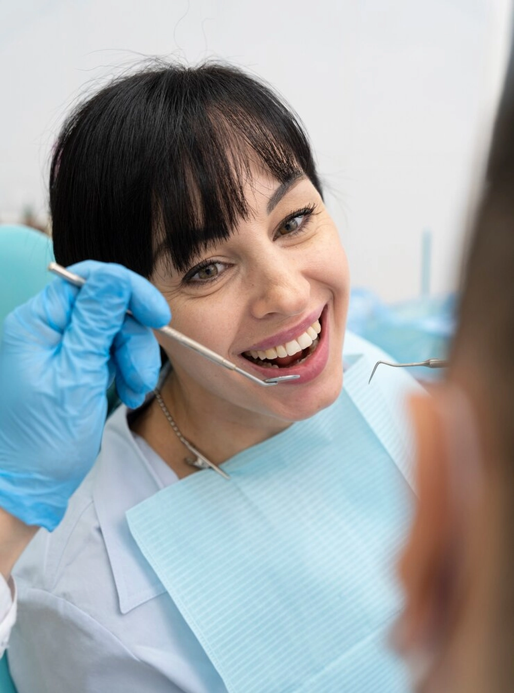 Patient discussing dental insurance and payment options